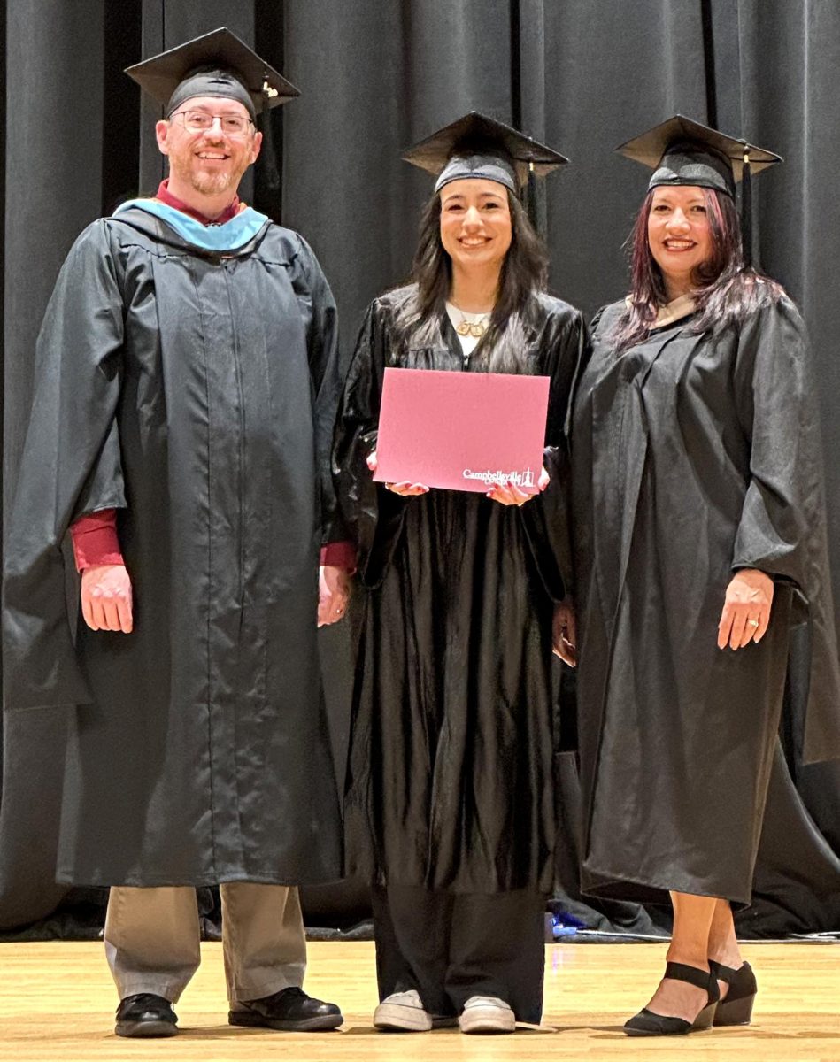Ariana Ortega graduated from Campbellsville Universitys ESL program in December of 2023. I am so proud of myself, and thankful for all the people who helped me throughout this journey, Ortega said. She’s pictured with Raquel Cunha, director of the ESL Program, and Joshua Detherage, assistant director of ESL.