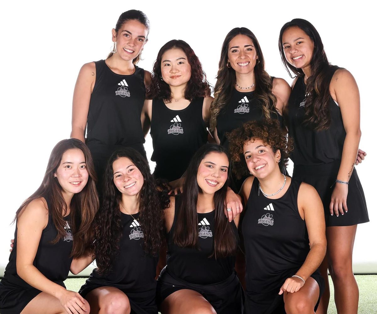 The members of the Lady Tigers tennis team are (front row from left) Miru Nonaka, Candela Converti, Angela Mendoza, Clara Asprella, (back row from left), Ariadna Perez, Miho Akita, Andrea Ovejero and Oriana Espinoza.