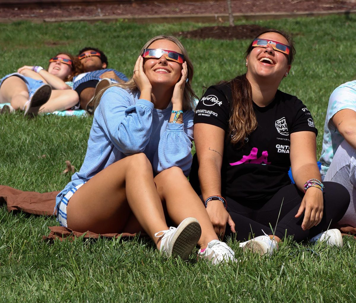 CU students Carli Tackett and Jimena Martinez enjoy the 2024 Solar Eclipse.
(Photo by Cathryn Jones, Campbellsville University's social media manager)
