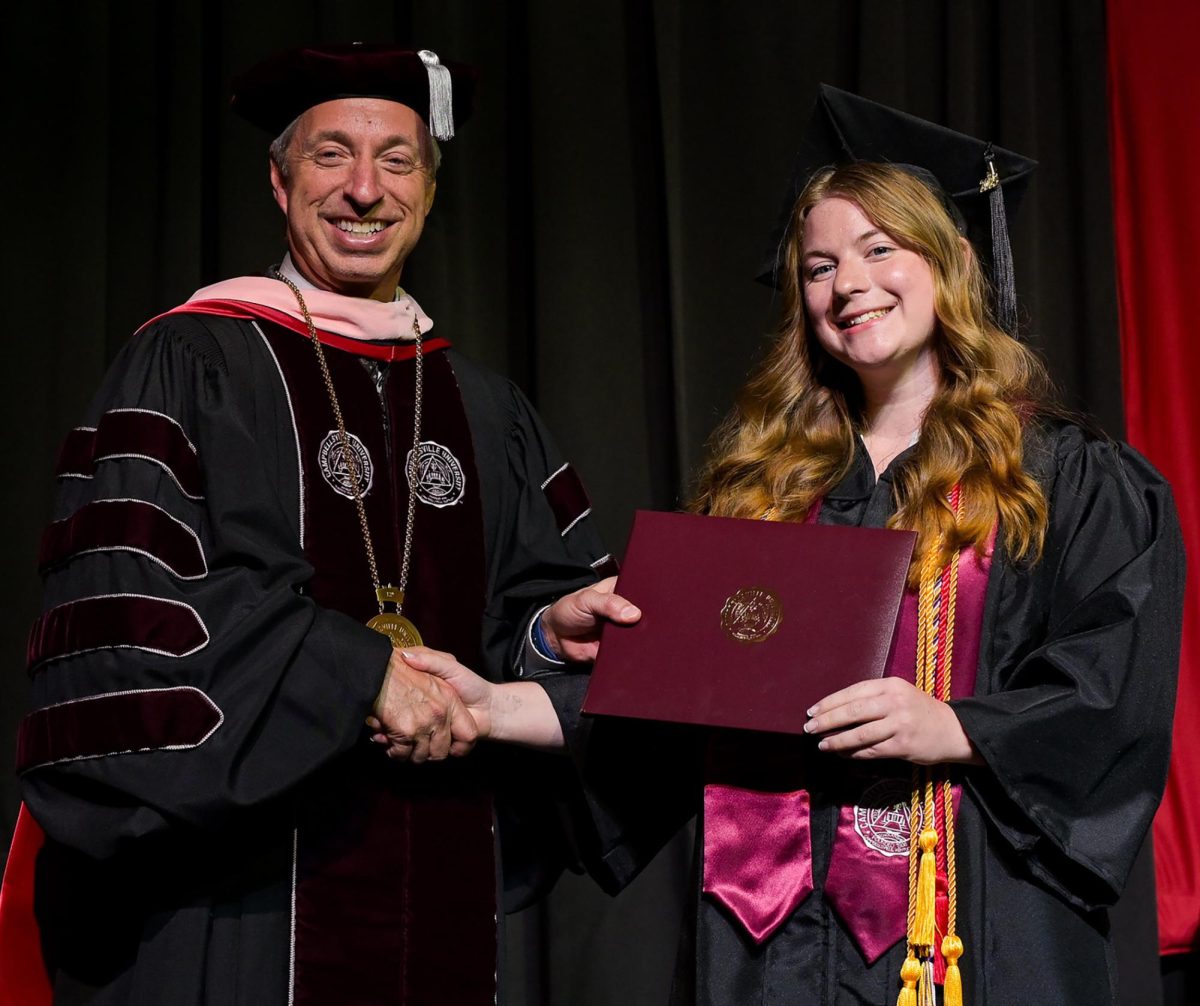 Kelsey Overall, pictured with Campbellsville University Dr. Joseph Hopkins at graduation, is moving to Chapala, Mexico to serve as a missions director for Oak Life, a school for orphan care.