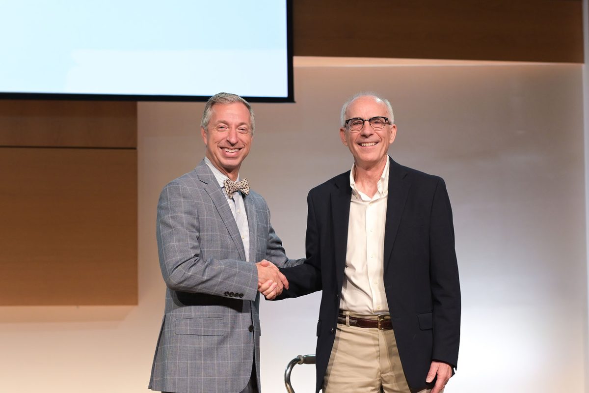 CU President Dr. Joseph Hopkins, left, recognizes Dr. John Hurtgen, professor of New Testament and Greek for CU, for 35 years of service to CU.
