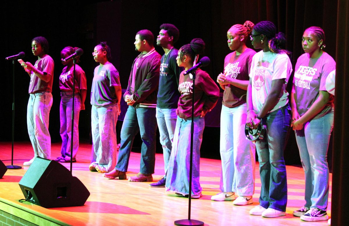The gospel choir performs at The Vine in Gheens Recital Hall.