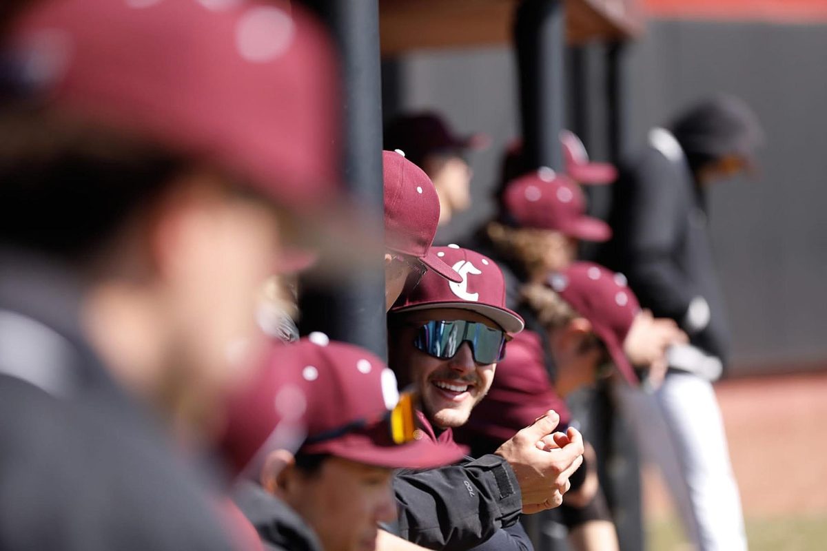Campbellsville University outfielder Brock Brubaker sits in the dugout with his teammates during his junior season.