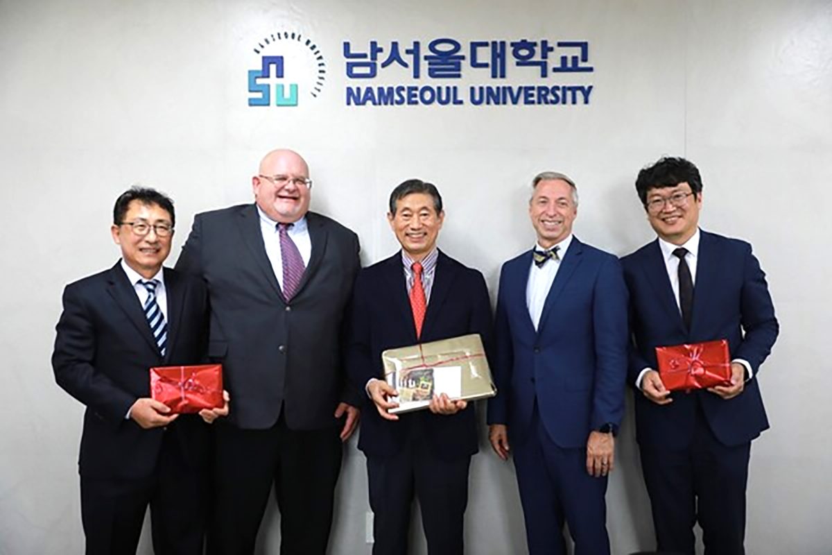 From left, members of the administration from Namseoul University and Campbellsville University, who recently met to discuss a partnership and opportunities for academic collaboration: Seomoon Dong, Dean of General Affairs (Namseoul University); Peter Thomas, Assistant Vice President for Global Relations (Campbellsville University); President Seung-Yong Yoon (Namseoul University); President Joseph Hopkins (Campbellsville University); and Dong-Ho Jang, Vice Dean for International Affairs (Namseoul University).