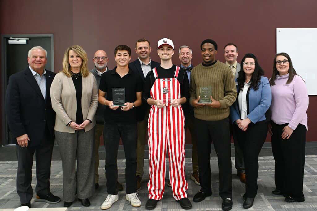 Campbellsville University student Bryce Osborne earned first place and a $1,000 prize at the university’s campus pitch competition. The event brought together student finalists and university leaders, who gathered for this group photo following the award presentations.