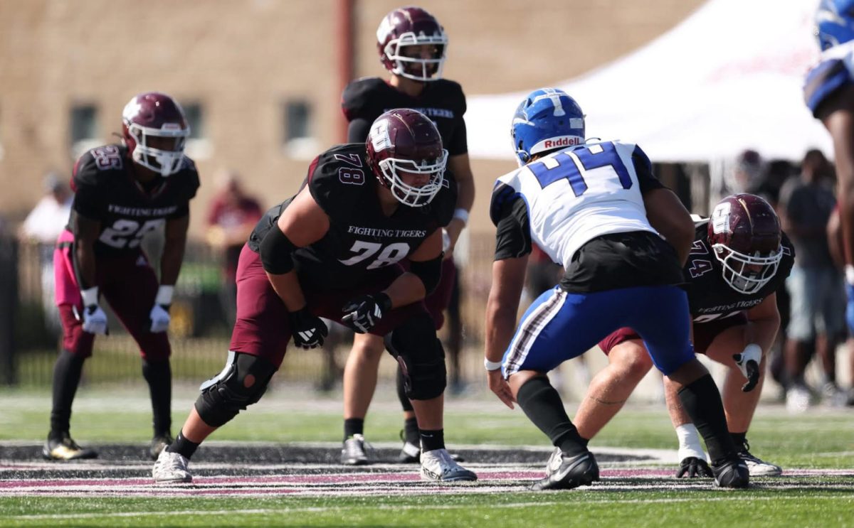 Senior Dhane Montgomery lines up at the line of scrimmage during a home game against Lindsey Wilson College. (Photo by Brett Pierce)