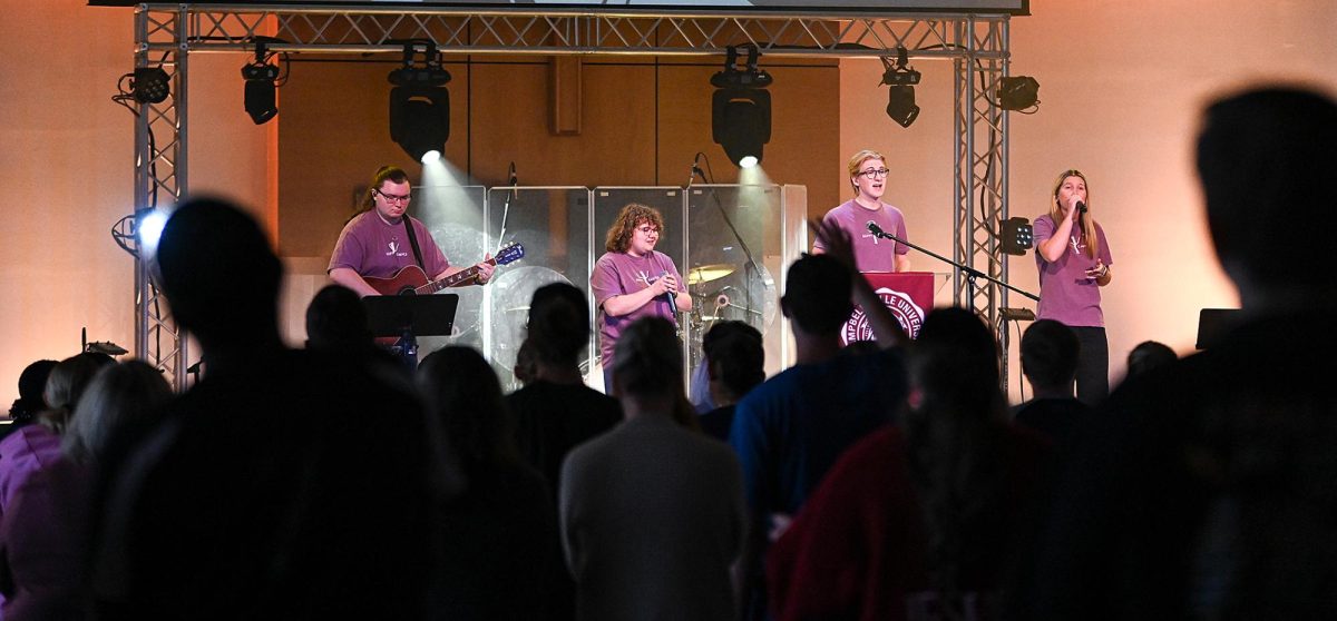 Worship is a significant part of chapel services at Campbellsville University. Hayden Behmke, current CU sophomore who leads worship with campus ministries, is pictured second to right. “The work that we are doing here and the mission that is fought for here is not for ourselves,” Behmke said. 