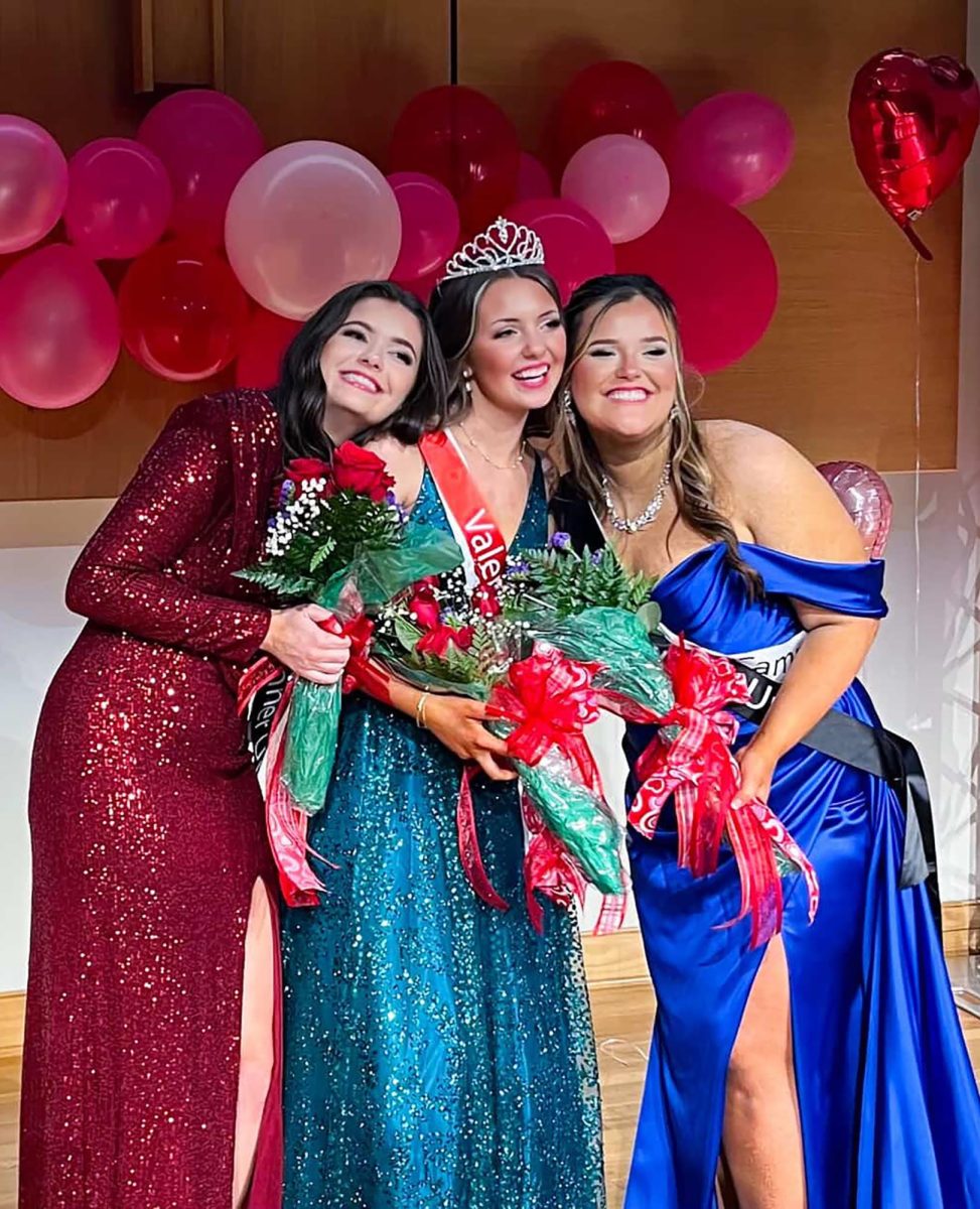 (Pictured from left) Cheyanne Nickels, Macy Brown and Abigail Duvall pose for a photo after the three of them placed in the pageant together two years ago.