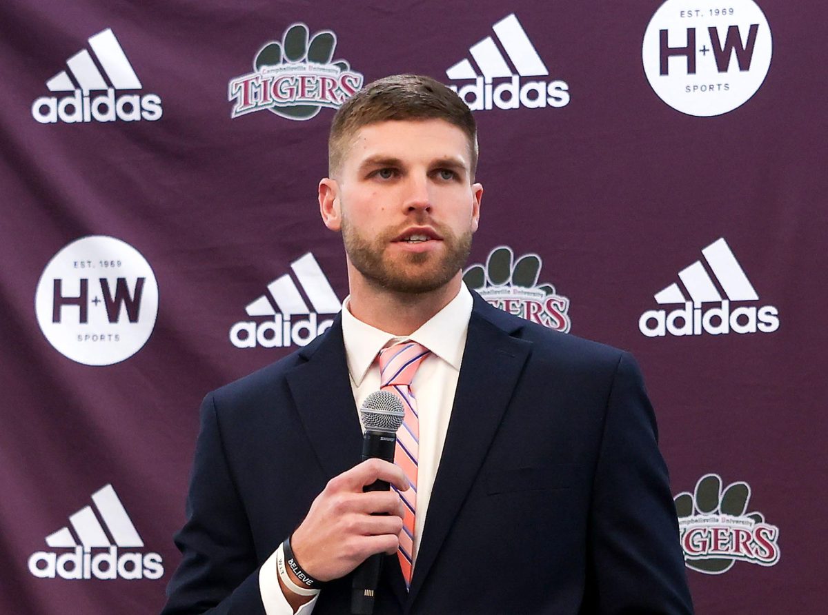 New Campbellsville University football coach Hunter Brown speaks to the media at a press conference on Feb. 16. Brown didn't shy away about his expectations for the program under his leadership. "This program will relentlessly compete each and every day,” said Brown. “We will build a consistent championship program that our alumni, our community, our players and everyone involved will be proud to support.” (Photo courtesy of CU Sports Information Department)