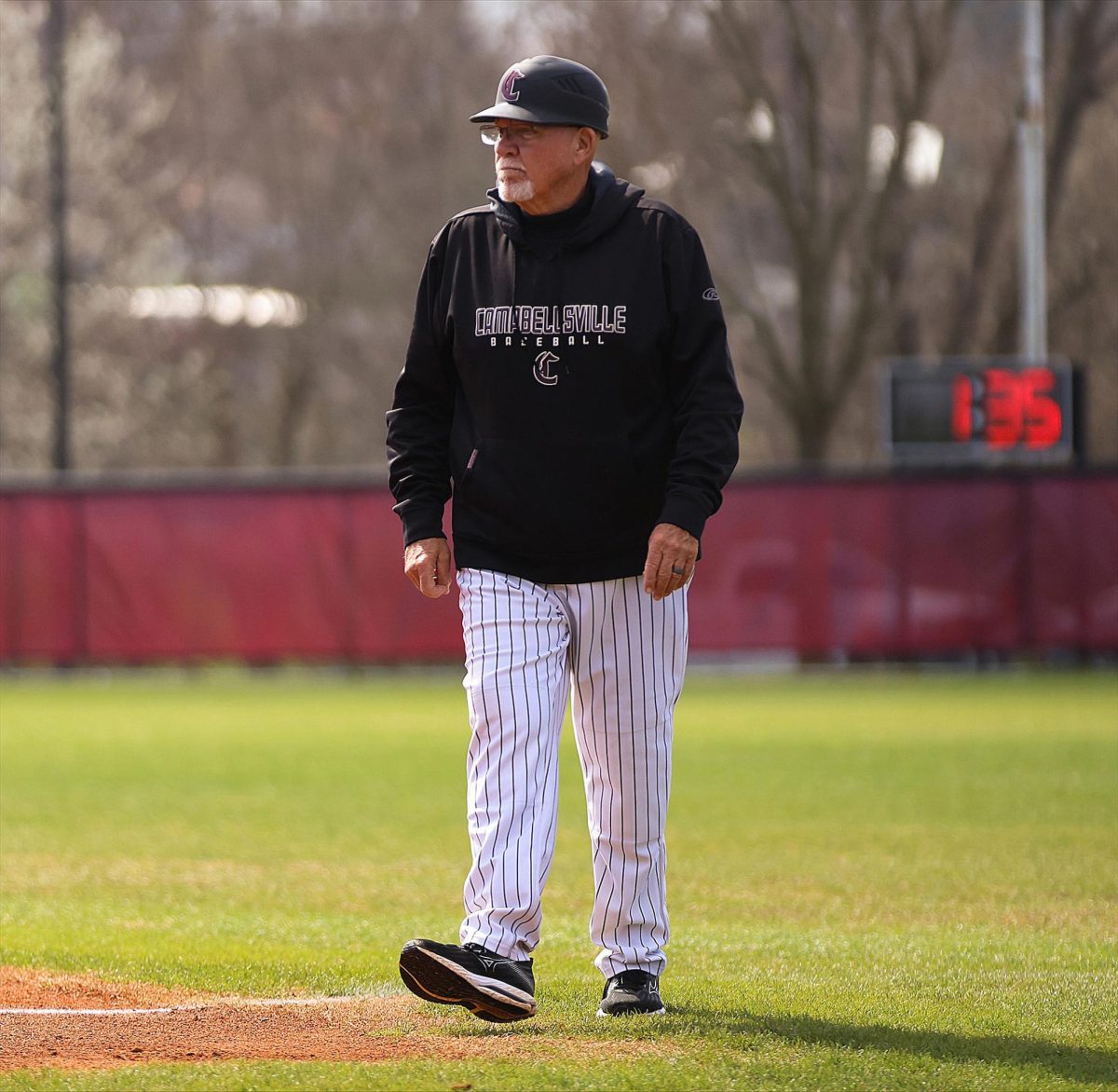 Head Baseball Coach Beauford Sanders walks across HIG Field during the team's March 9 game against Talladega College. (Photo provided by the CU Sports Information Department) 
