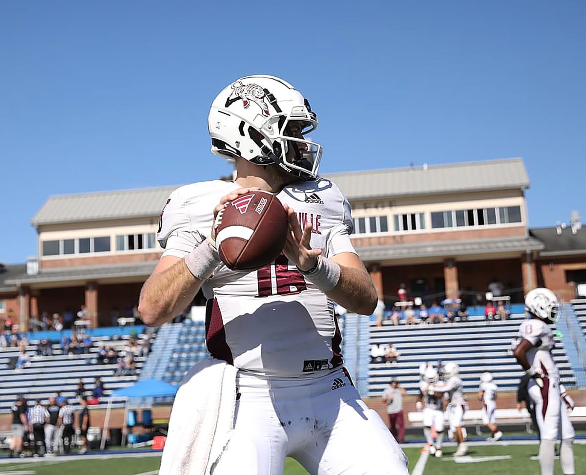 Campbellsville quarterback Jagger Gillis warms up during a road game at Lindsey Wilson. Gillis led the Tigers to a 9-2 record during his final season playing football. (Photo provided by Jagger Gillis)